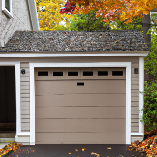 Suburban Wellesley garage with a partially open wooden raised-panel door, driveway and autumn trees.
