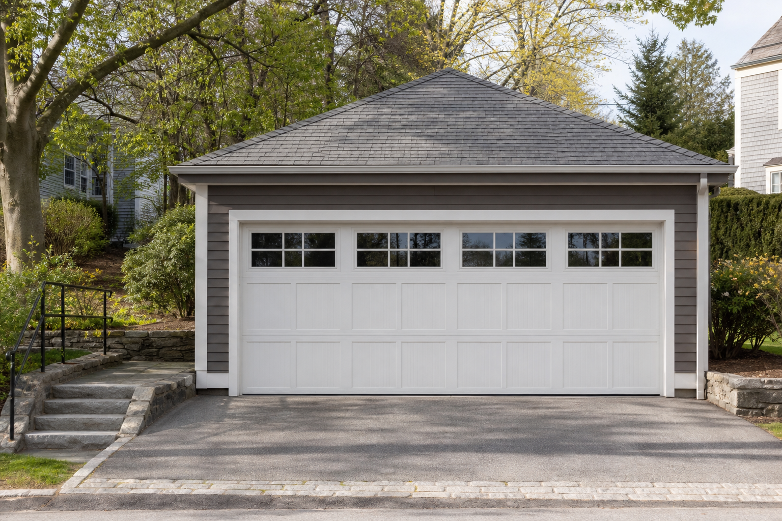 Suburban Wellesley garage exterior with a visible garage door on a quiet residential street